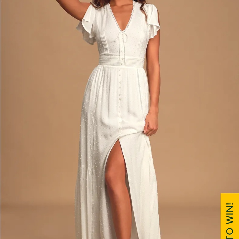 Cute white dress! Perfect for wedding events. Great condition